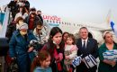 Passengers disembark from an airplane carrying Jewish immigrants fleeing the war in Ukraine, upon arrival in Israel’s Ben Gurion Airport, on March 6, 2022. (Photo by Menahem Kahana/AFP via Getty Images)