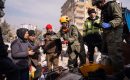 An Israeli search and rescue experts hands a bottle of water to a civilian in Turkey following the devastating earthquake on February 6, 2023. (Photo: IDF on Twitter)